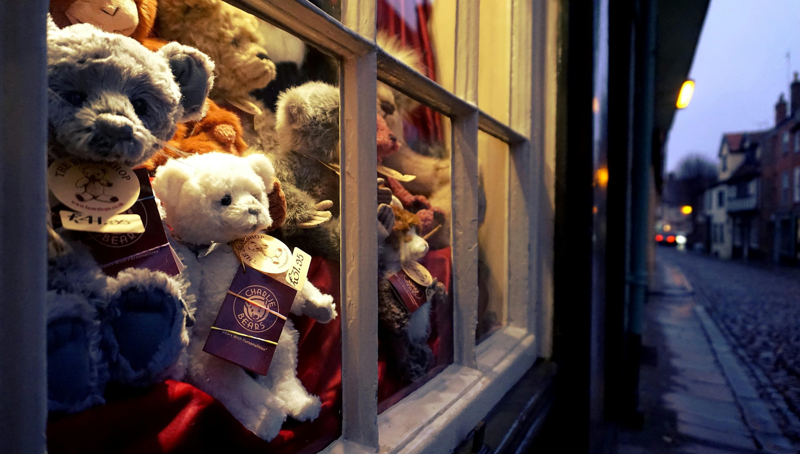 Cozy shop window in Norfolk, England with teddy bears. Perfect for home décor, Baby & Toys, gift ideas, and Quality Toys.